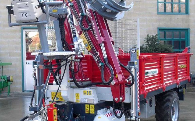 Forestry loader for tractors, trailers, and power hoes VERSUS